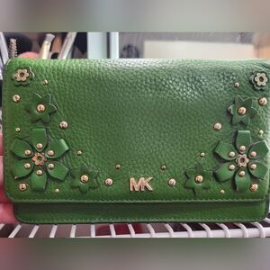 Michael Kors Green Flowered Wallet. In beautiful condition on outside.